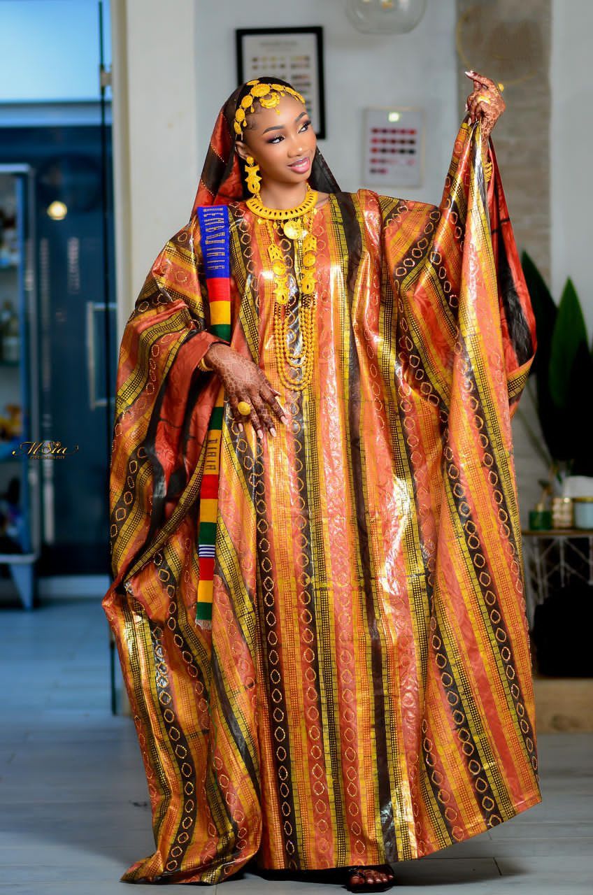 A Niger woman in traditional attire representing modern fashion.
