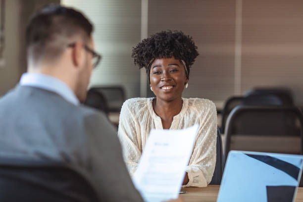 An image showing how African Immigrants dress for job interviews in the West with their natural hair