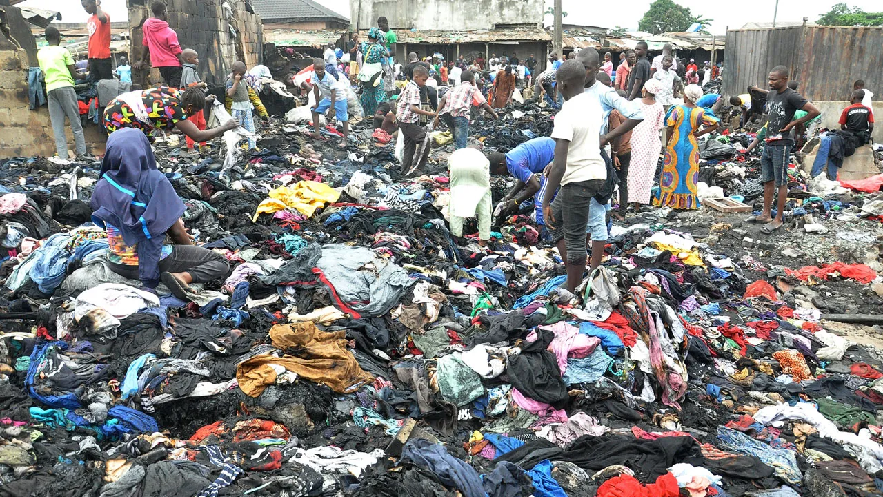 An image showing people buying second hand clothes from Katangua market in Lagos