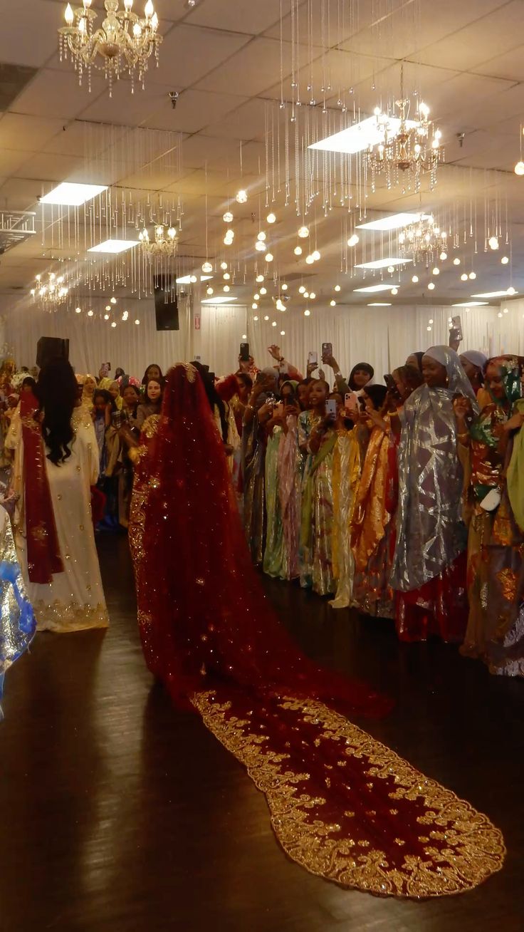 Somali bridal party in coordinated Guntiino styles for diaspora wedding celebration.