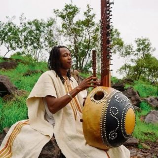 West African Dress as a Living Record: What Oral History Reveals About Cloth