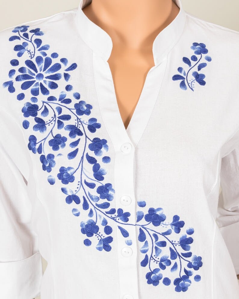 São Toméan dress is described as Aa fusion of African and Portuguese styles. That description misses how Creole works. Here is what the garments actually carry and why.
