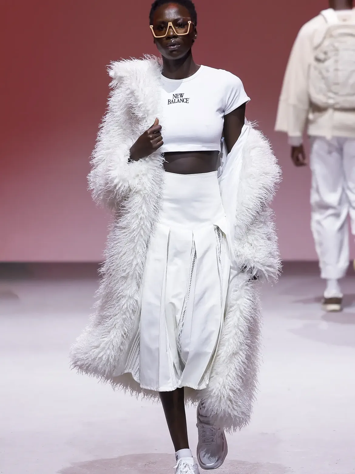  An image showing a model wearing a piece by Ruald Rheeder and New Balance during the South African Menswear Week