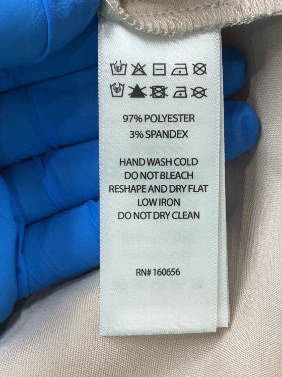 How to Read a Fabric Label Without Mistaking It for a Supply-Chain Record